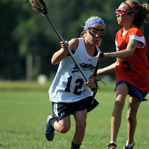 Maddy Sterling playing lacrosse as a youth