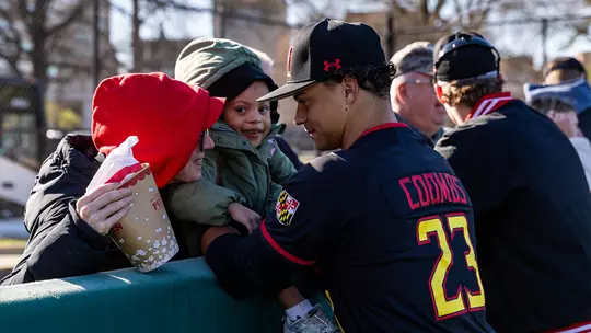 Bud Coombs with fans at a Maryland baseball game