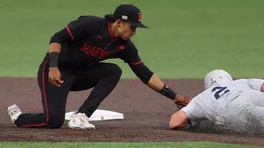 David Mendez tags out a runner against Penn State