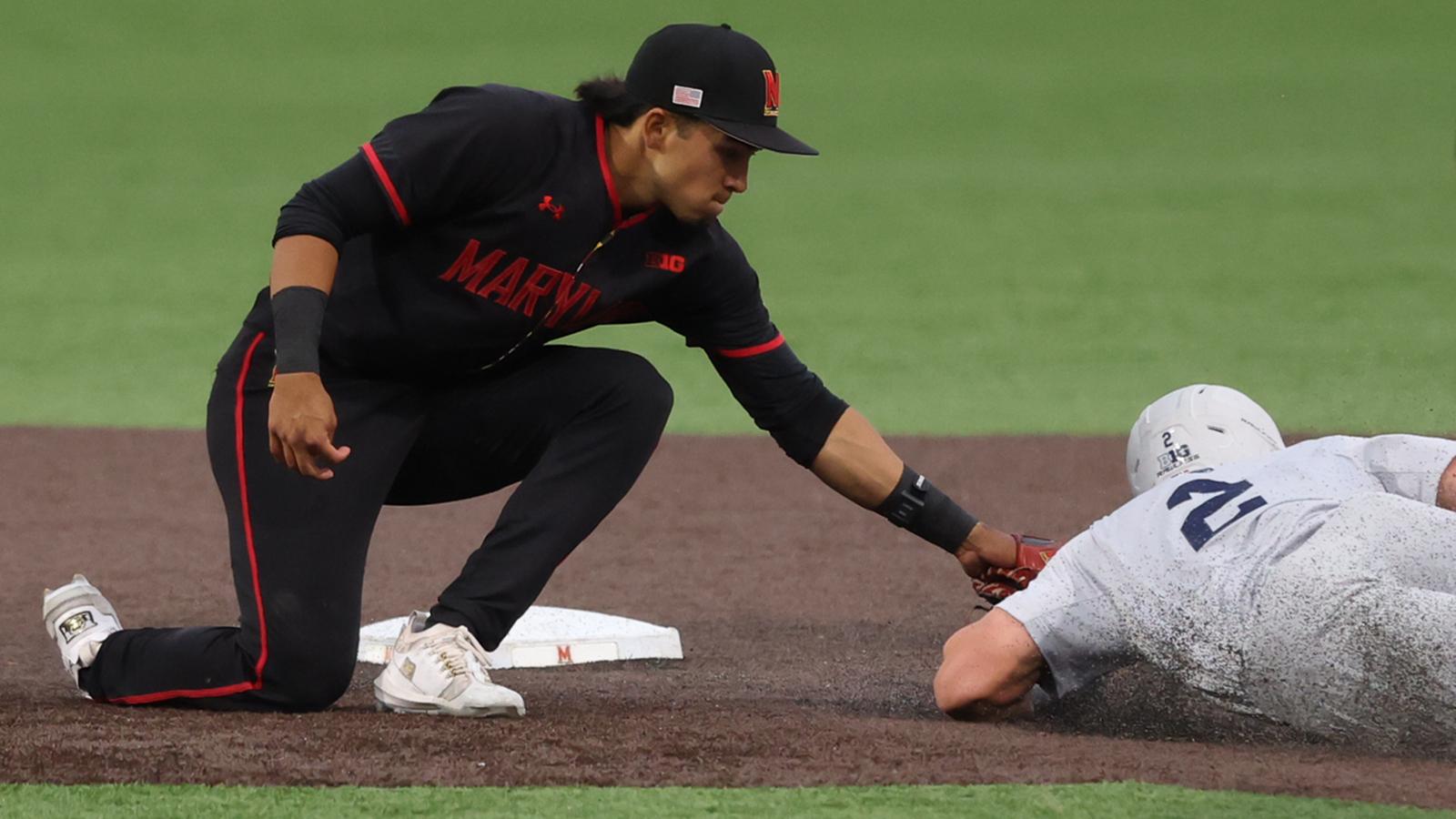 David Mendez tags out a runner against Penn State