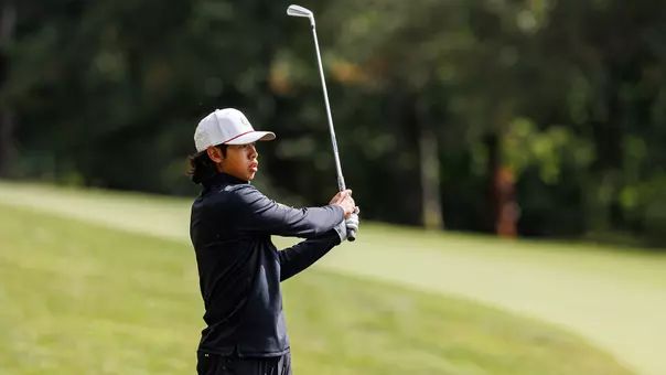 Ben Siriboiry swings a golf club