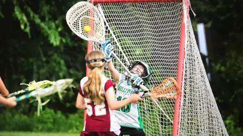 JJ Suriano playing lacrosse as a youth