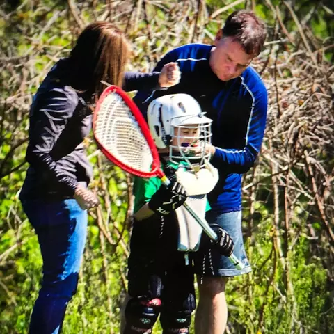 JJ Suriano playing lacrosse as a youth