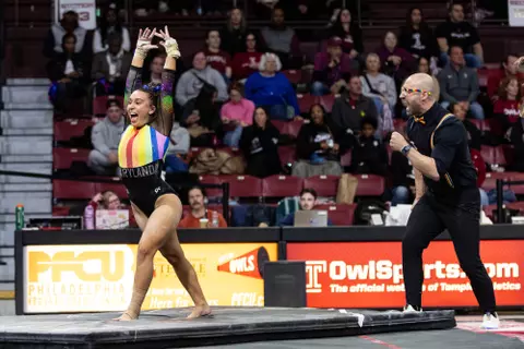 Aine Reade, Assistant Gymnastics Coach JJ Ferreira
Maryland Terrapins Women's Gymnastics vs the Temple Owls, Penn Quakers and the Towson Tigers at McGonigle Hall in Philadelphia, PA on Thursday, Mar. 5, 2026. Rose Fernandes/Maryland Terrapins