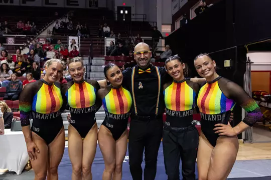 Assistant Gymnastics Coach JJ Ferreira, Taylor Rech, Josephine Kogler, Katrina Mendez-Abolnik, Madeline Komoroski, Megan Bingham
Maryland Terrapins Women's Gymnastics vs the Temple Owls, Penn Quakers and the Towson Tigers at McGonigle Hall in Philadelphia, PA on Thursday, Mar. 5, 2026. Rose Fernandes/Maryland Terrapins