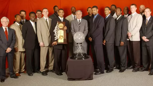 2001-02 Men's Basketball National Championship Team Photo With Trophy