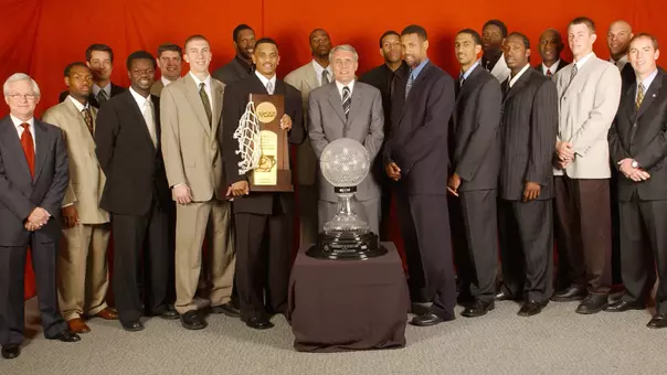 2001-02 Men's Basketball National Championship Team Photo With Trophy