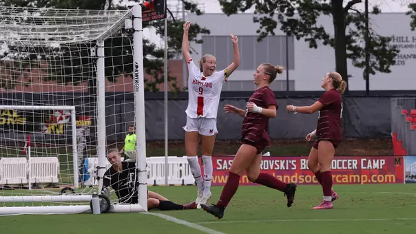 Jolie Farmer celebrates a goal against Fordham