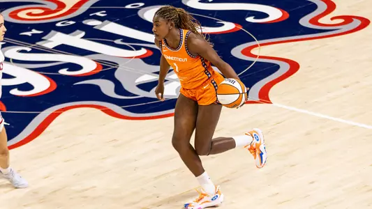 Diamond Miller dribbles WNBA