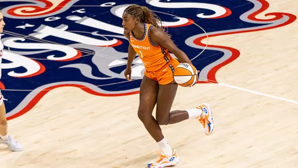 Diamond Miller dribbles WNBA