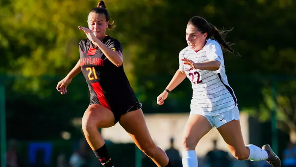 Lilly Bane fights for possession against Virginia Tech