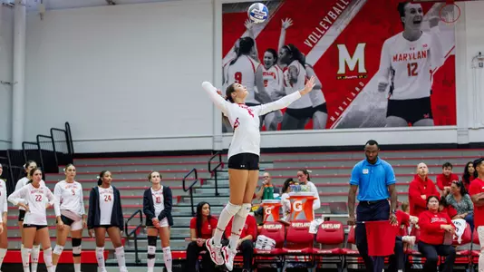 Haley Melby Action Shot Jumping to Serve against Georgetown