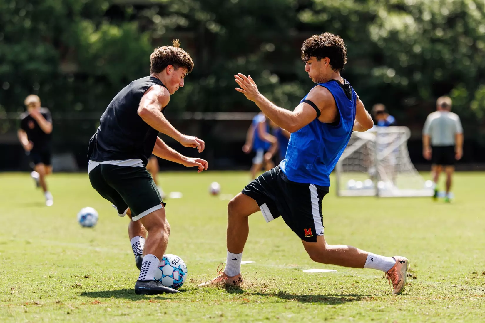 Midfielder Luke Burdett (2), Defender Emil Nymann Anderson (55)
Photos from Men's Soccer practice at Ludwig Field in College Park, MD on Tuesday, Aug. 4, 2026.
Allison Mize/Maryland Terrapins