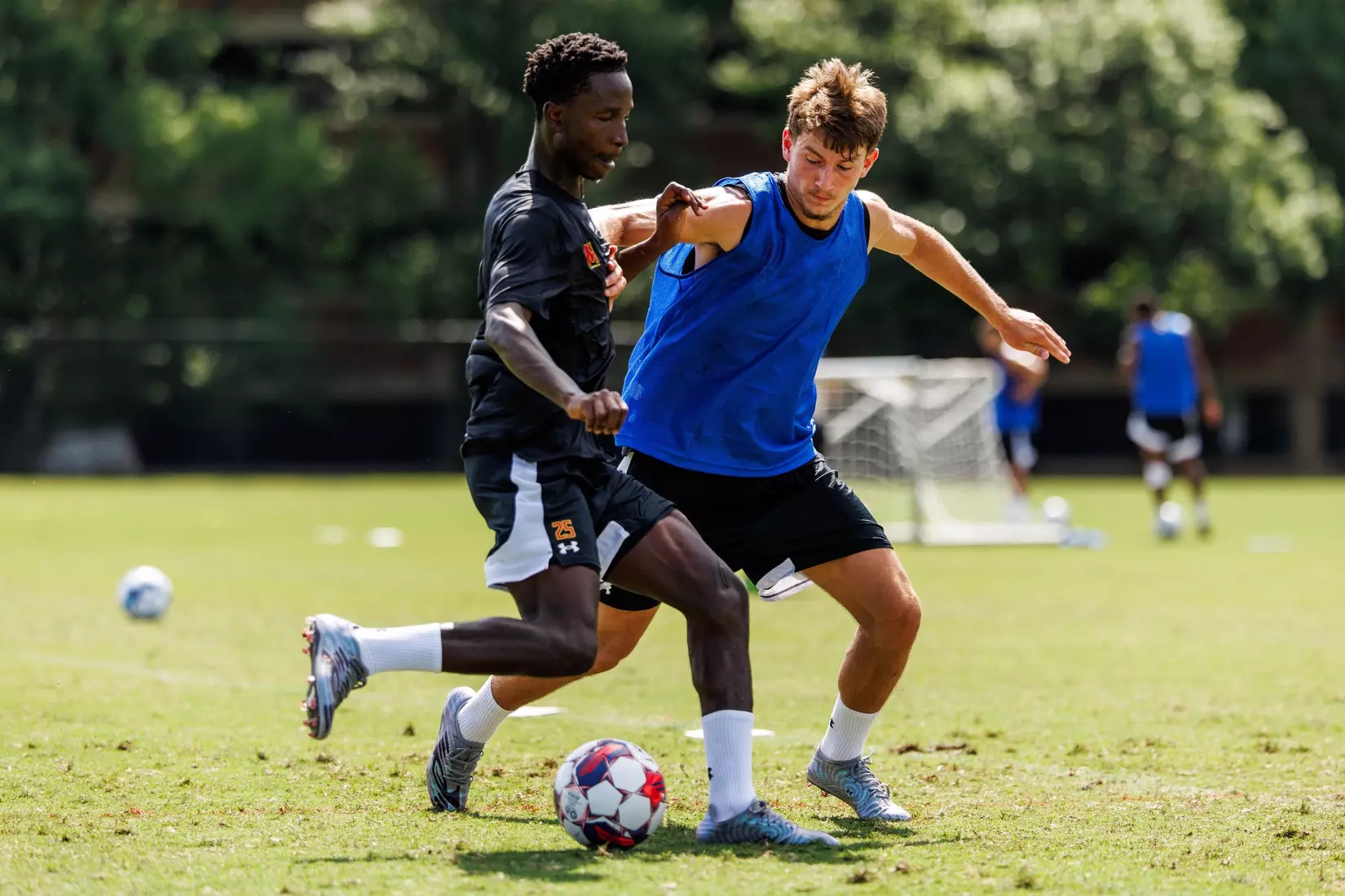 Defender Lilian Fichelle (3), Forward Dennis Kalanzi (25)
Photos from Men's Soccer practice at Ludwig Field in College Park, MD on Tuesday, Aug. 4, 2026.
Allison Mize/Maryland Terrapins