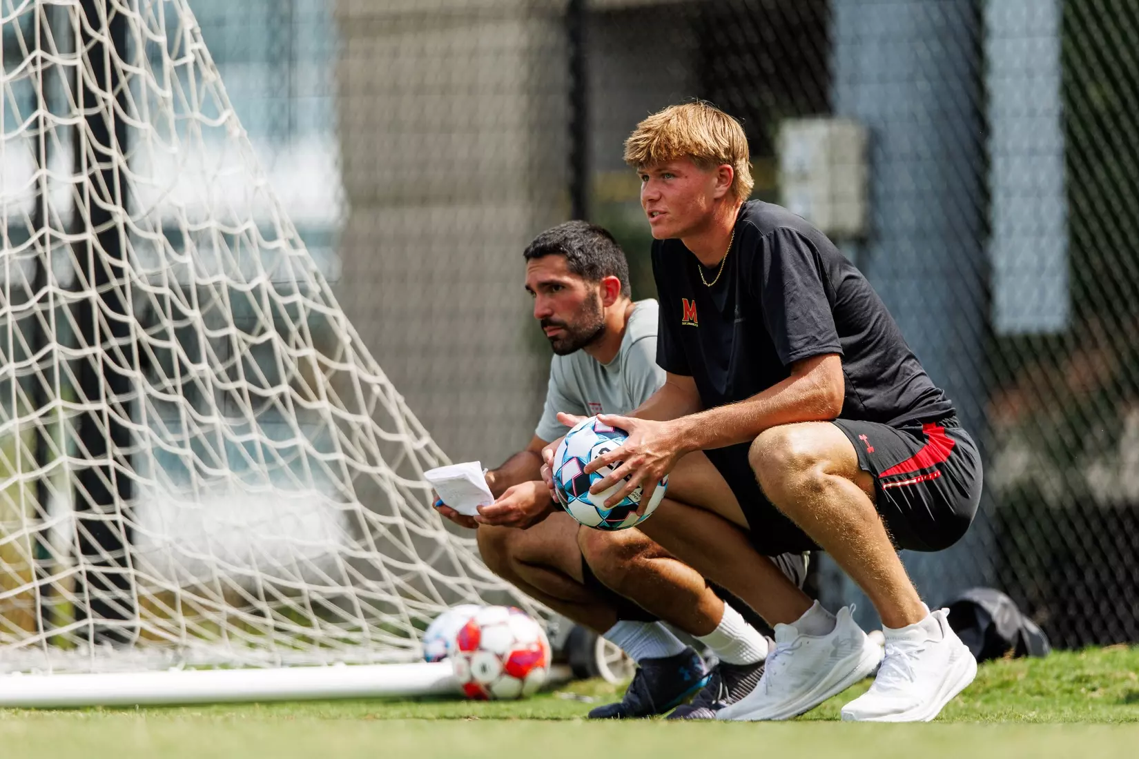 Goalkeeper Zach Cielewich (33), Assistant Coach Michael Gould
Photos from Men's Soccer practice at Ludwig Field in College Park, MD on Tuesday, Aug. 4, 2026.
Allison Mize/Maryland Terrapins