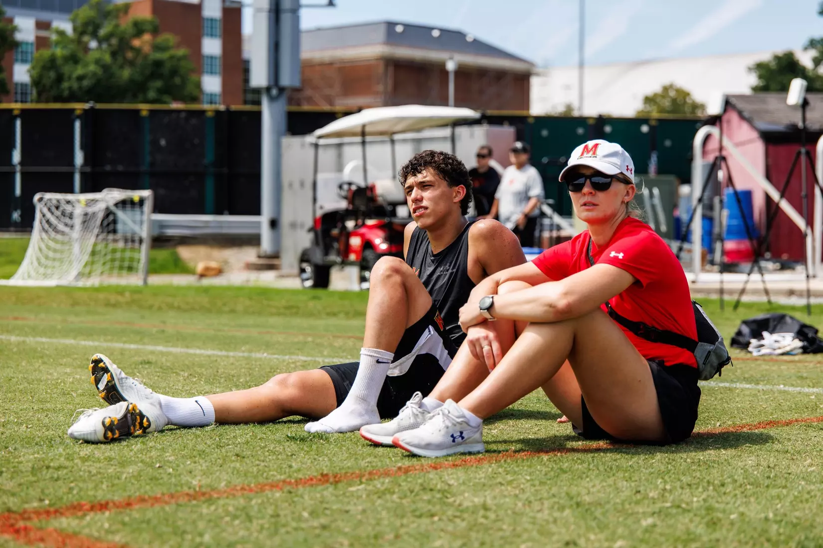 Forward Said El Eyssami (99), Athletic Trainer Katelyn Engen
Photos from Men's Soccer practice at Ludwig Field in College Park, MD on Tuesday, Aug. 4, 2026.
Allison Mize/Maryland Terrapins