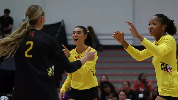 Maryland celebrates a point against Saint Peter's