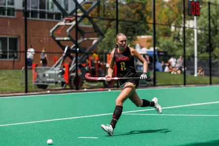 Ella Beach runs for a ball against Temple
