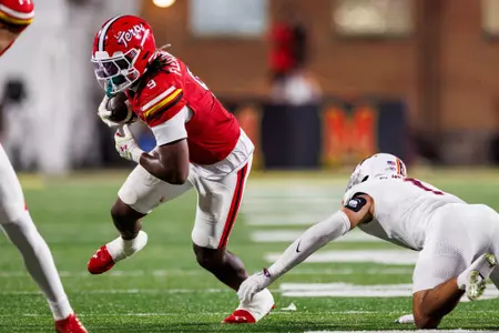 Dorian Fleming breaks a tackle against Virginia Tech