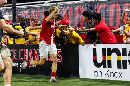 Ljubomir celebrates with fans after win vs No. 7 Wisconsin