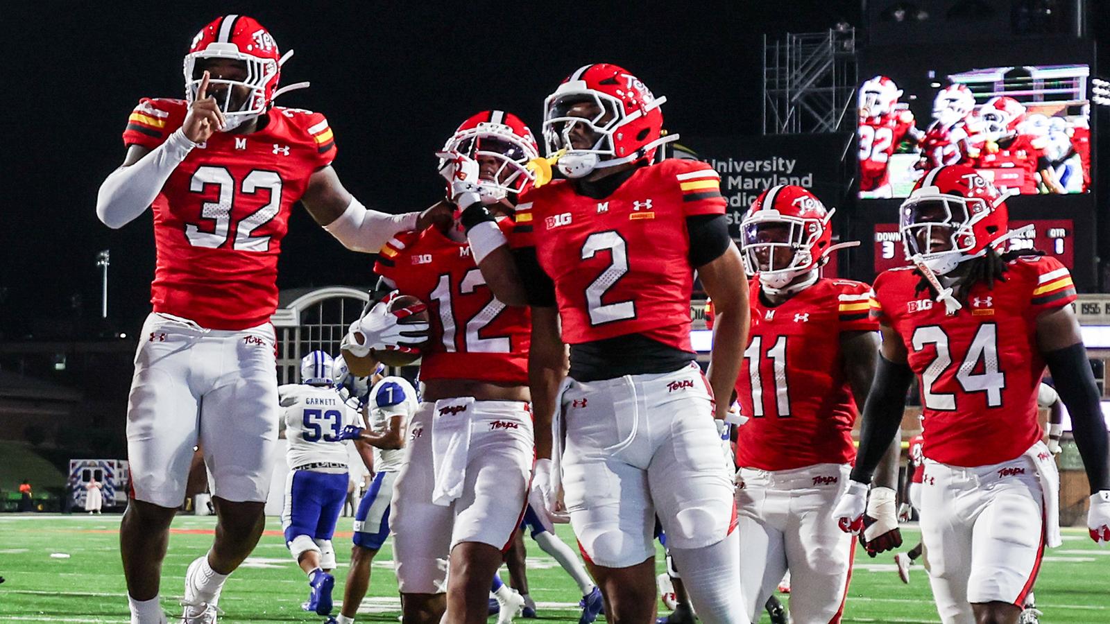 Maryland celebrates an interception against Hampton
