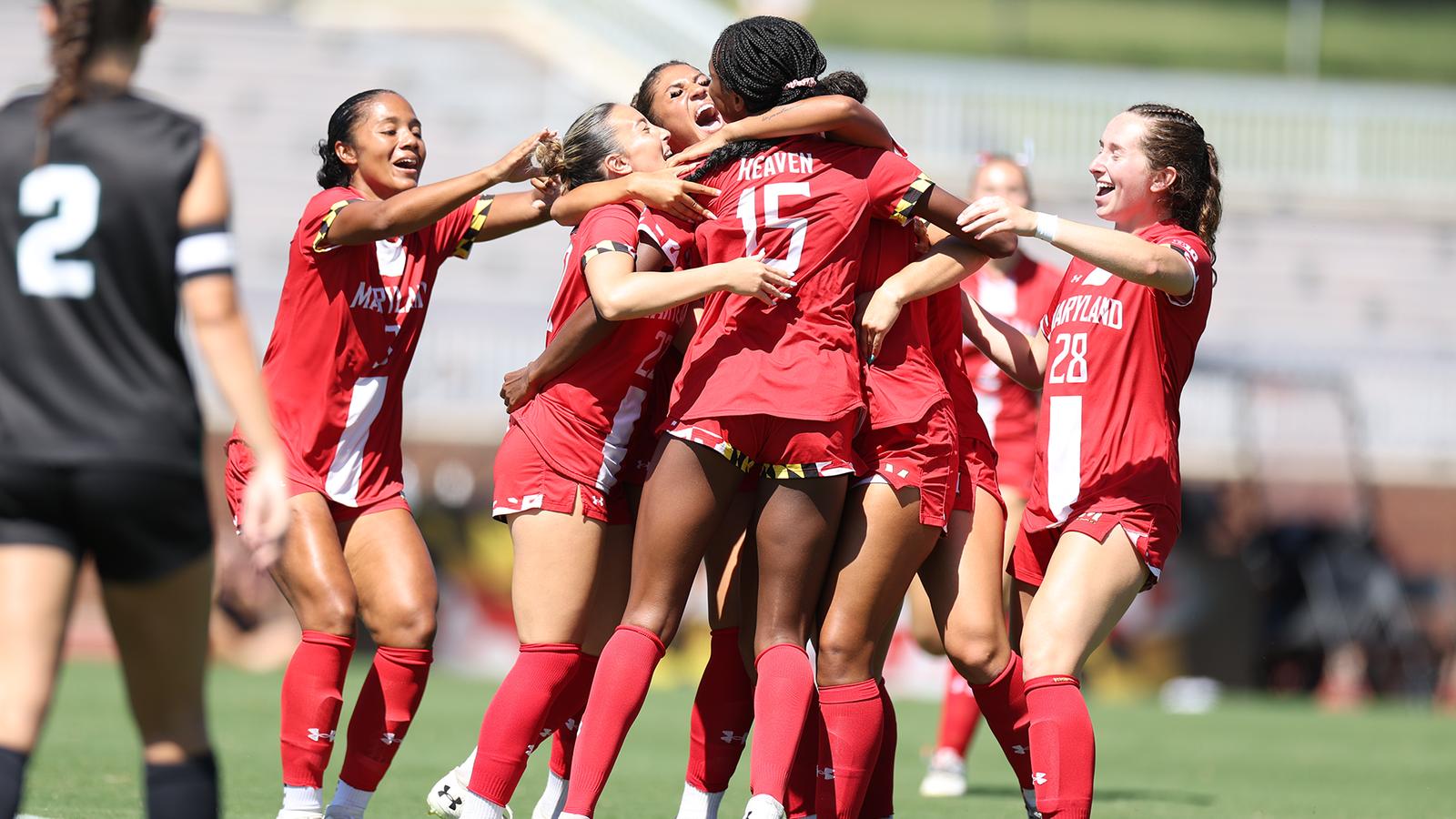 Photo: umterps.com Maryland celebrates a goal against Binghamton