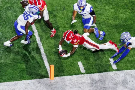 Iverson Howard dives for a touchdown against Hampton
