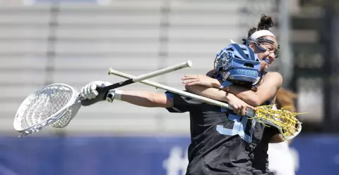 North Carolina's Taylor Moreno (30) and Marie McCool (4) embrace as North Carolina's wins the 2018 ACC Lacrosse Championship in Durham, N.C., Sunday, April 29, 2018. (Photo by Lynn Hey, theACC.com)