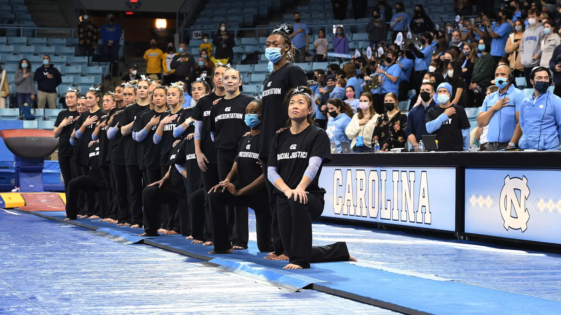 The Tar Heels line up for the national anthem.