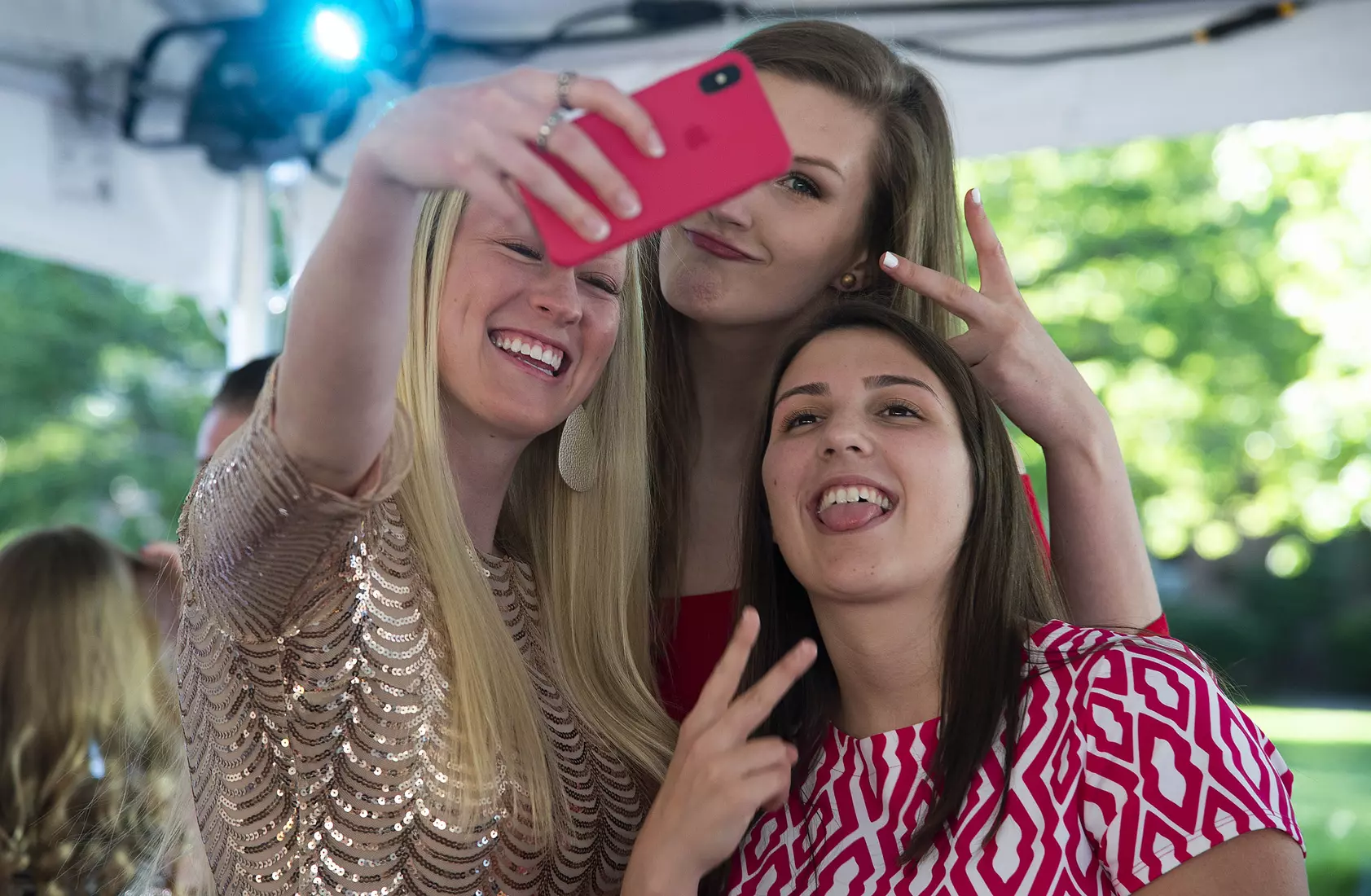 Taylor Koenen, Naomi Van Nes, and Liz Roberts take a selfie before the Rammys.