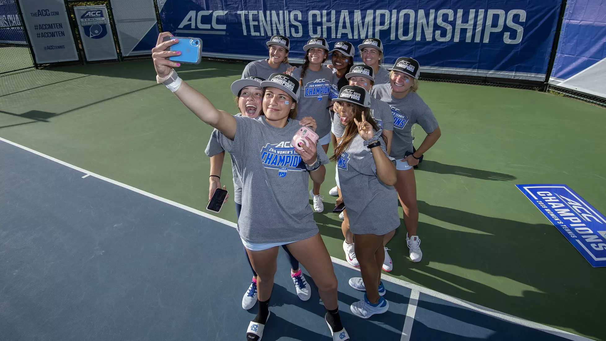 Alexa Graham and the Tar Heels pose for a selfie.