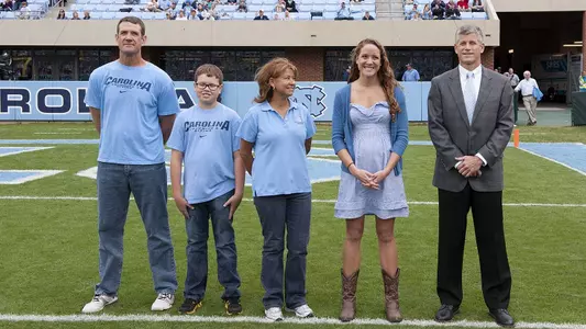 Swim: Peacock Honored at Football Game