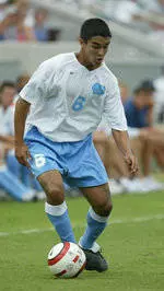 Sloustcher Lifts Tar Heels Past No. 12 UVa in ACC Opener