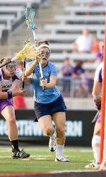 Northwestern Downs Tar Heels, 21-7, For Fifth Consecutive NCAA Title