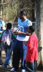 Football Players Visit Chapel Hill-Carrboro YMCA