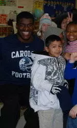 Football Players Participate In Read Across America