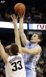 Zeller's 18 and 18 Help No. 5 Tar Heels Beat Wake Forest 68-53
