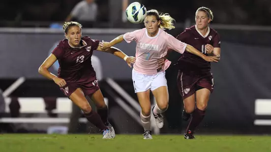 Late Charge Lifts Heels Past Wolfpack