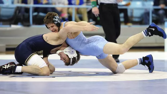 Heilmann, Ward Advance To Scuffle Quarters