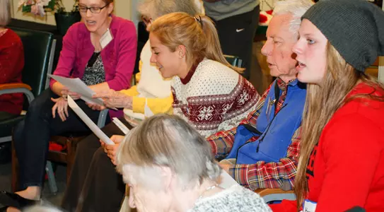 Tar Heels Spread Cheer At Charles House
