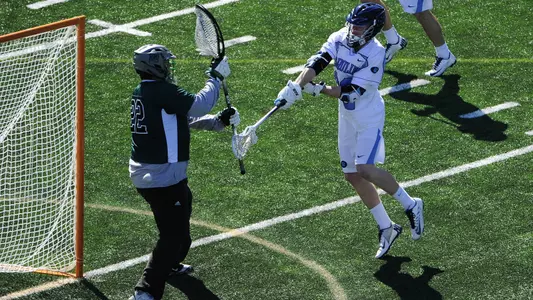 Trio of Hat Tricks Powers Tar Heels Past Manhattan