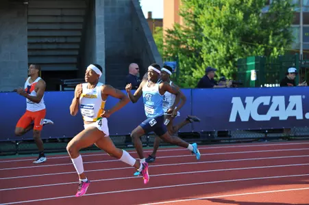 Rahn and Alowonle Earn First Team All-America Nods