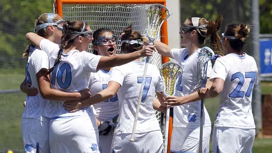 Tar Heels Dominate Notre Dame, 18-4, To Advance