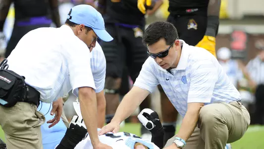 Athletic Trainers Boyd, Walker Earn National Honors