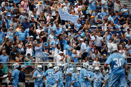 Fans celebrate a goal. (Photo by Peyton Williams)