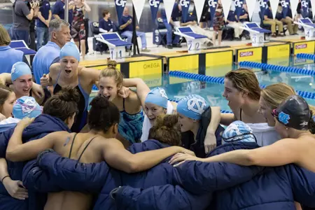 Carolina swimmers leading cheers.jpg