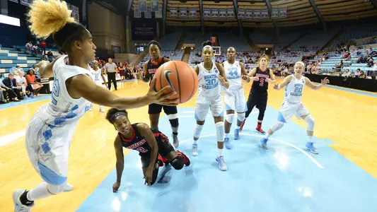 Paris Kea saves the ball from going out of bounds.