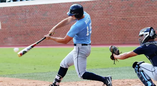 Michael Busch (15) rips a double down the right field line.