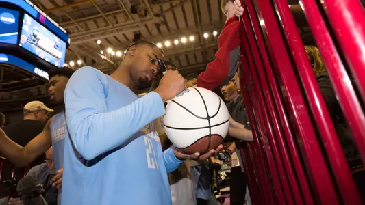 Seventh Woods signs autograph