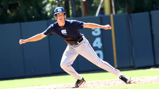 Kip Brandenburg (38) leads off first.